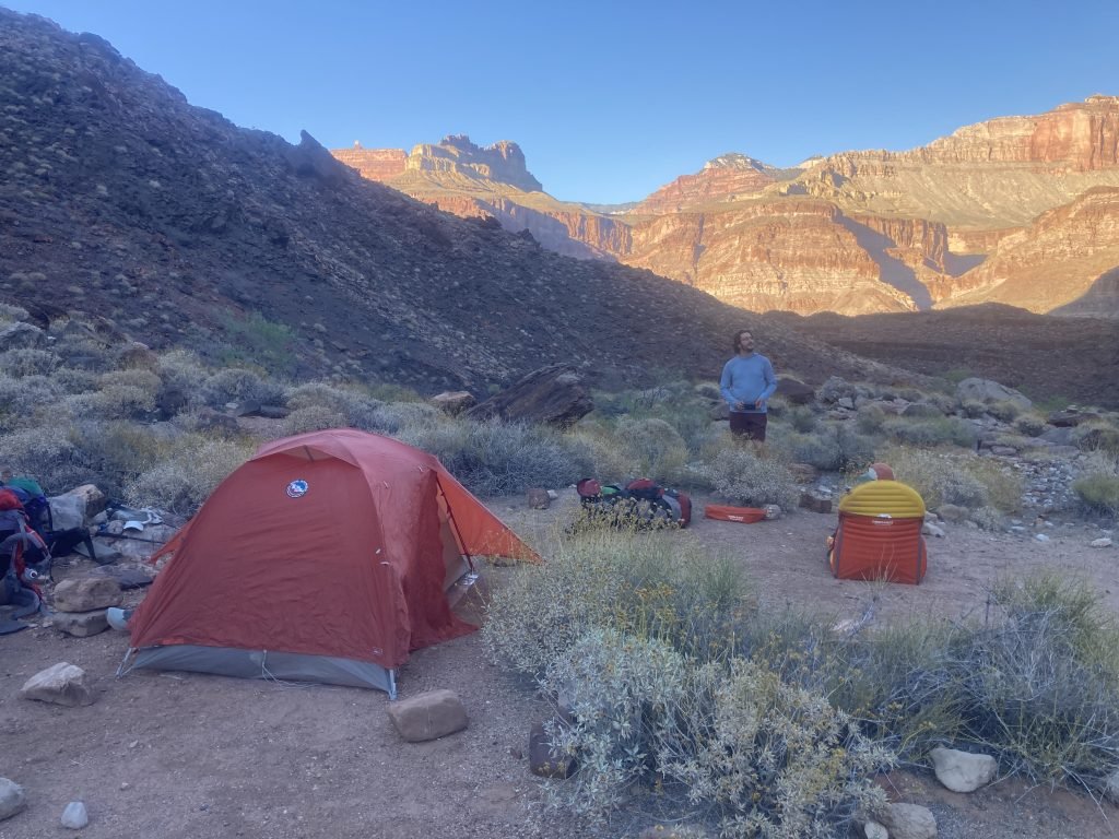 Reid soaking his feet in the river